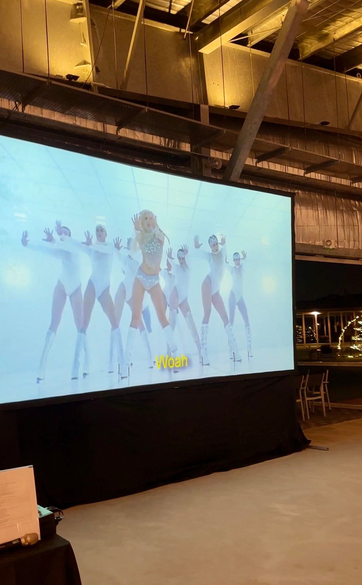 Custom Lyric Change video premiere at wedding reception – customer gift shown on big screen
